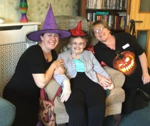 Summerdyne Halloween - resident and two carers in witches hats