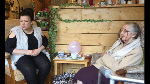 coffee with a resident at the dementia cafe