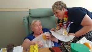 Dee with resident sharing cocktails in hydration week