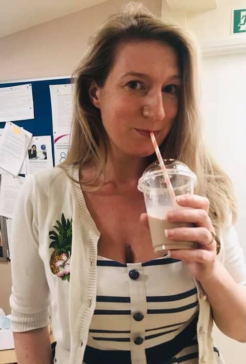 administrator drinking fruit smoothie