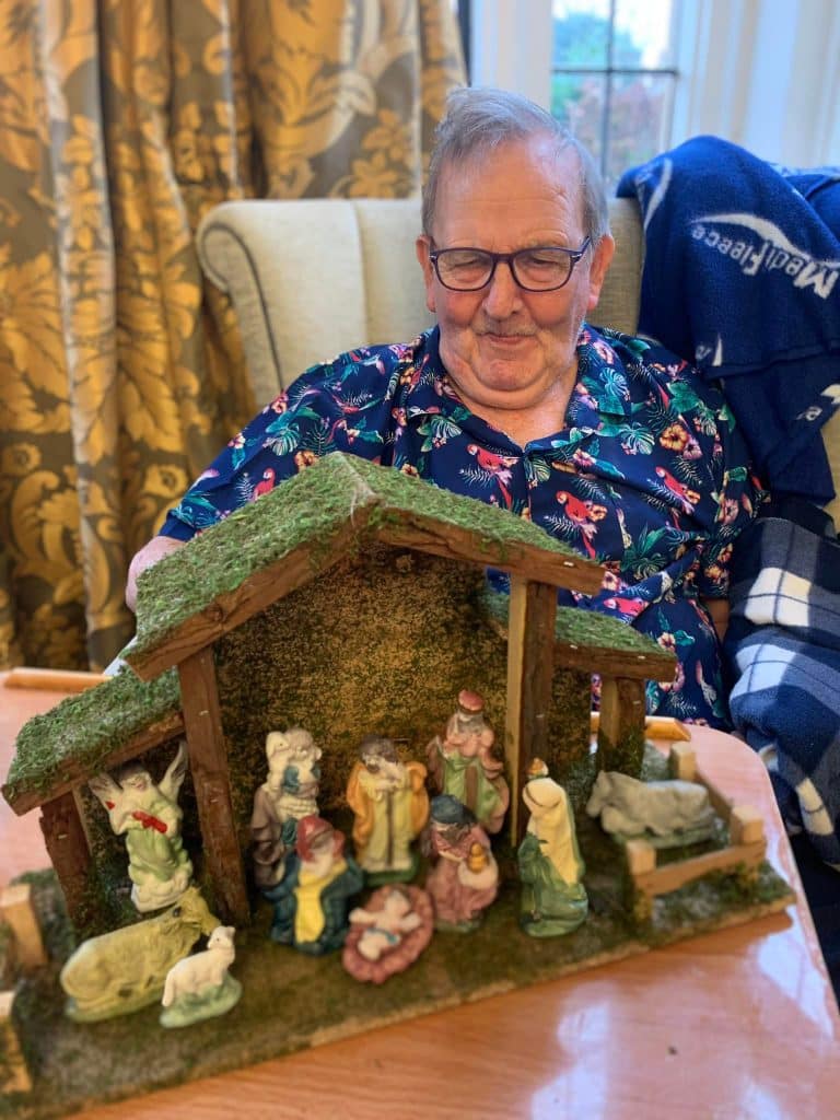 Resident with nativity scene