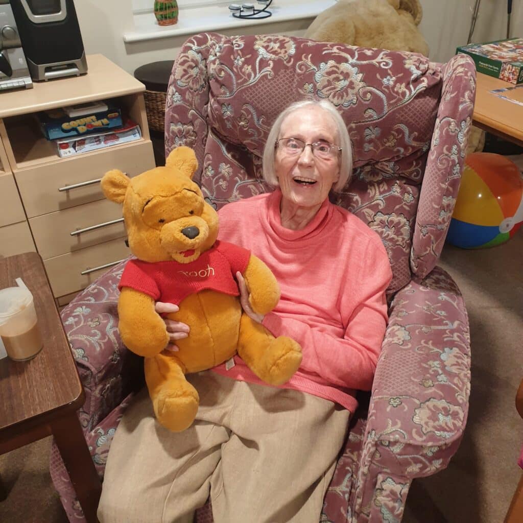 resident with Pooh Bear
