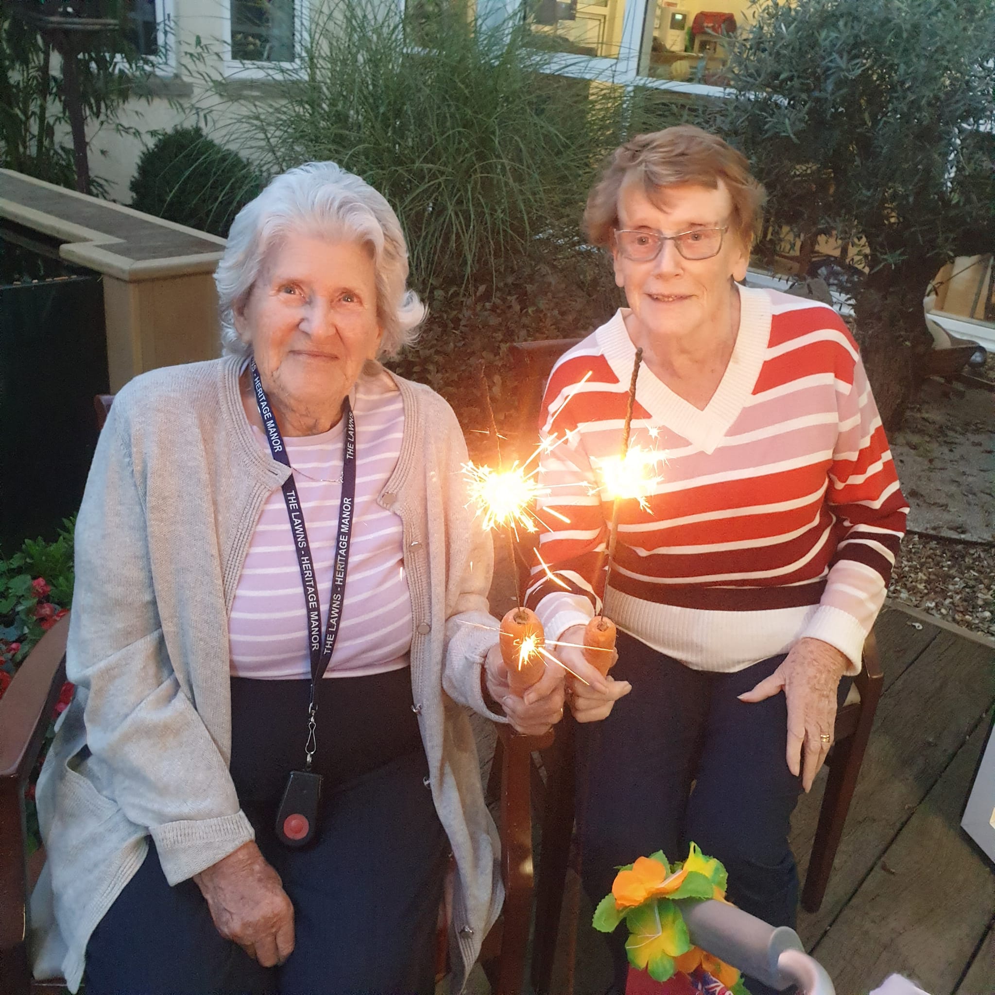 countdown to Christmas - two residents with sparklers