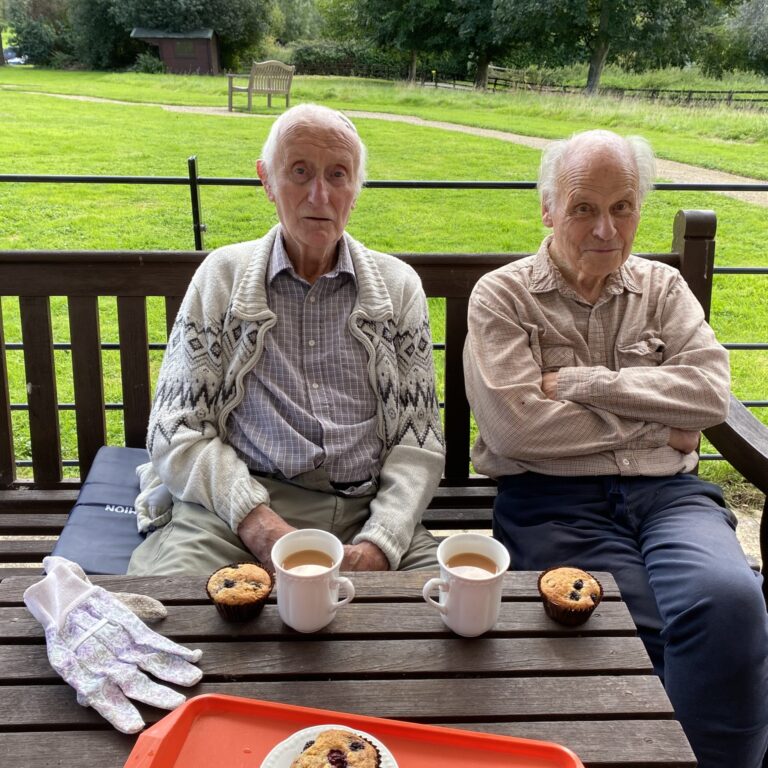 Chef team - two gents enjoying muffins